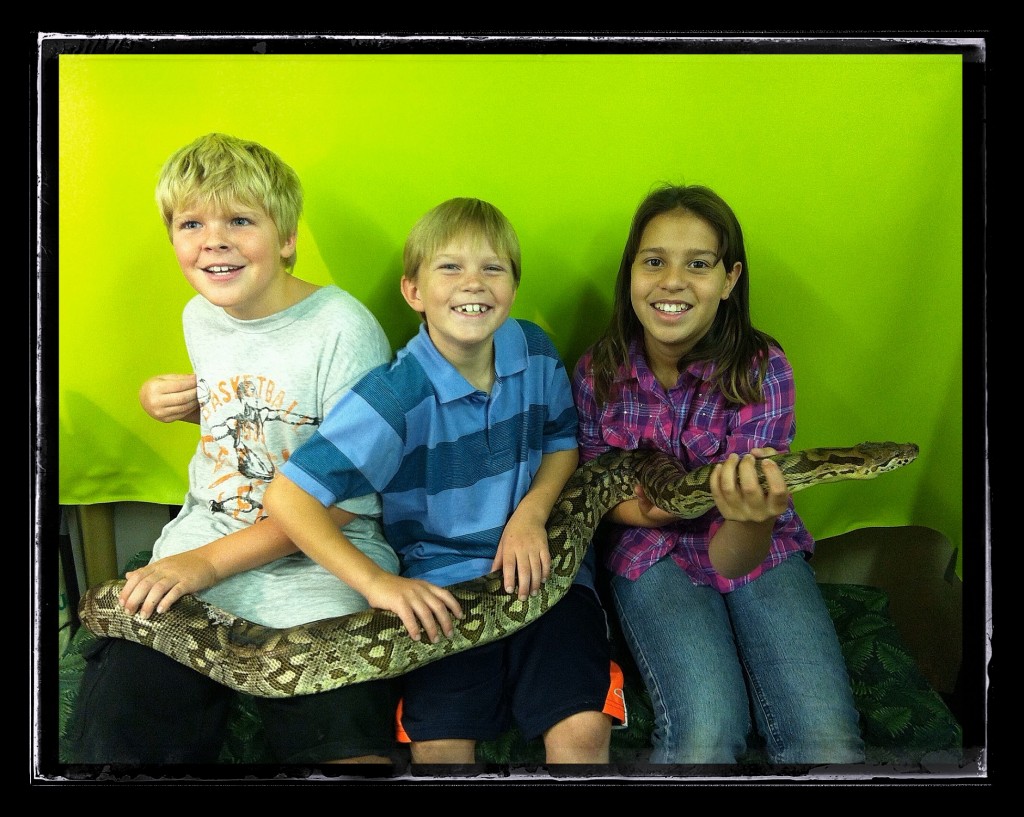 Their courage to sit with a snake!  Keatyn's nervous of the snake swirling behind him!