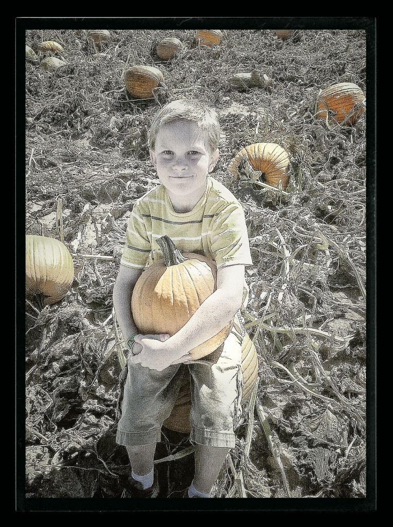Derek with his pumpkin.
