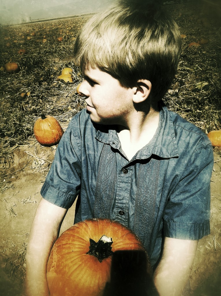 Keatyn with his own pumpkin.